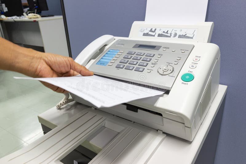 Person using a fax machine