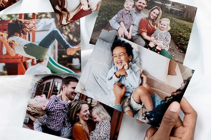 Printed photographs arranged for display