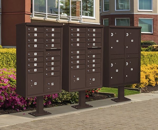 Outdoor physical mailbox units with individually numbered compartments