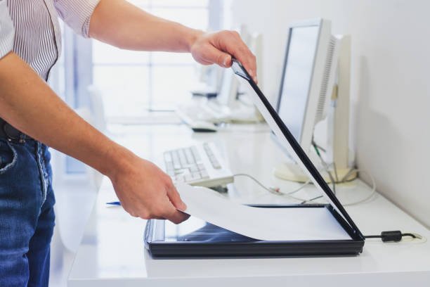 Document being scanned in an office